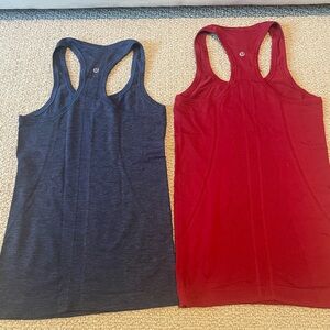2 swiftly razor back tanks , geathered blue and a  red, size 2, original length